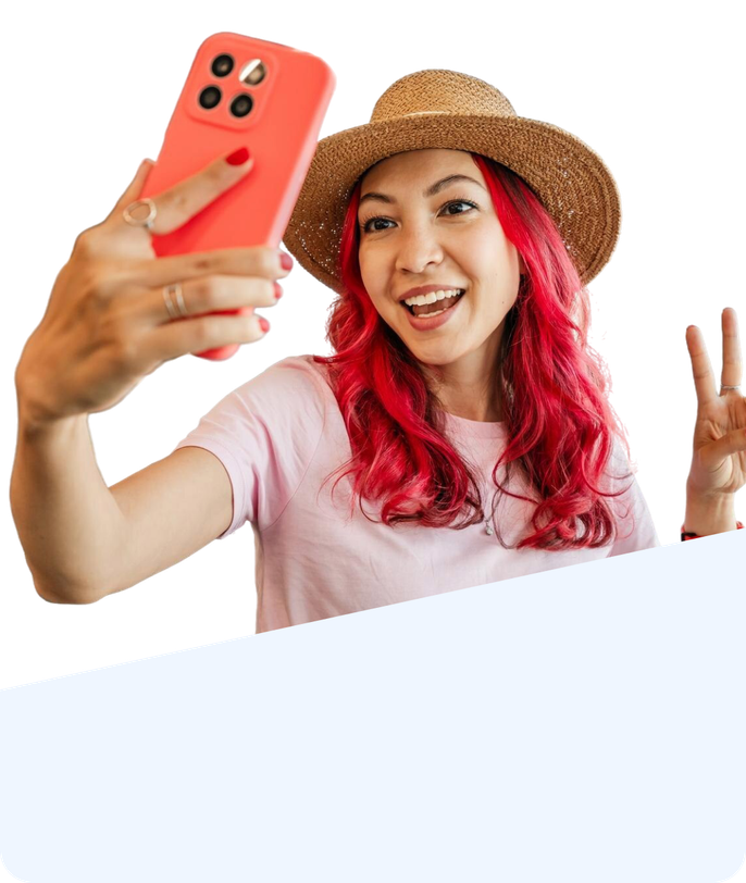 Woman taking a selfie with her phone at the airport