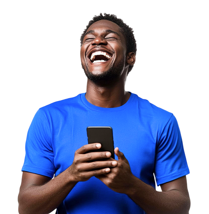 Man in a blue shirt smiling while looking at his phone