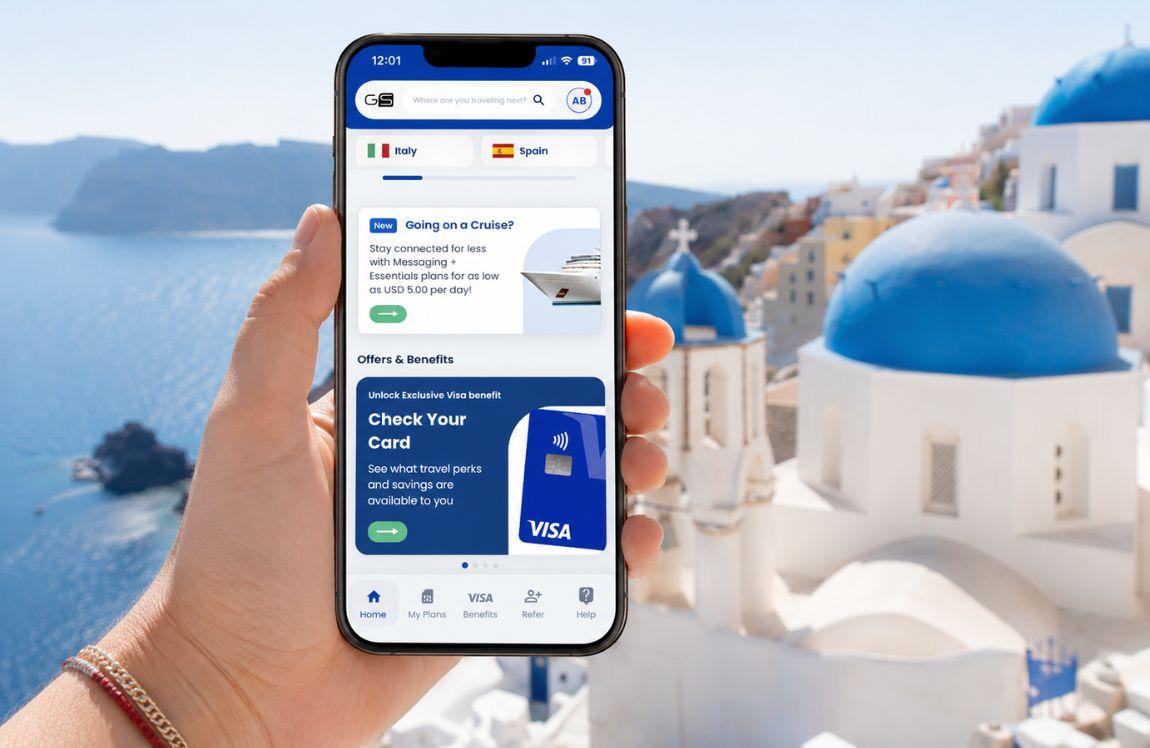 Hand holding a smartphone displaying the GigSky eSIM app with Santorini, Greece, and the Aegean Sea in the background.