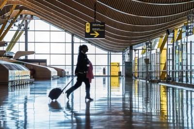 Traveler walking through an airport terminal