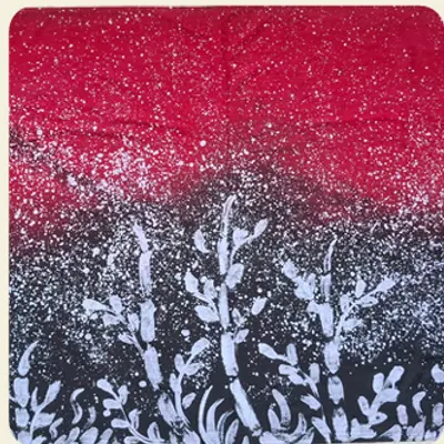 Kain Batik Tulis Malangan gradasi merah-hitam dengan motif tumbuhan putih di bagian bawah.