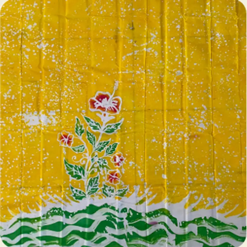 Kain Batik Tulis Malangan kuning dengan motif bunga merah dan gelombang hijau di bagian bawah.