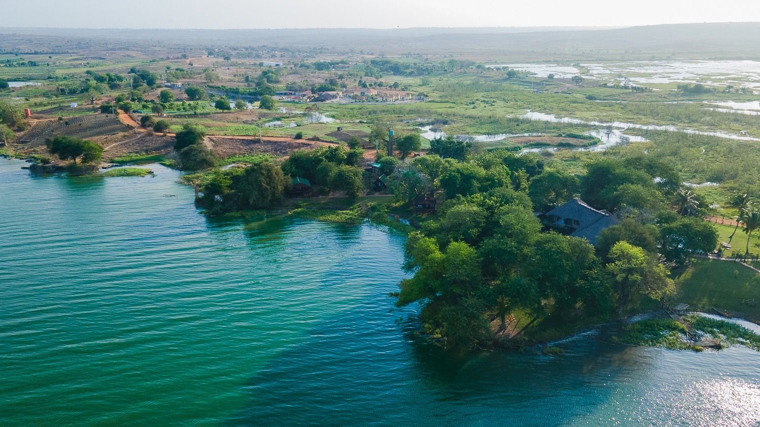 Aerial view of the Kilunda Lagoon and the wooded shore where the lodge stands