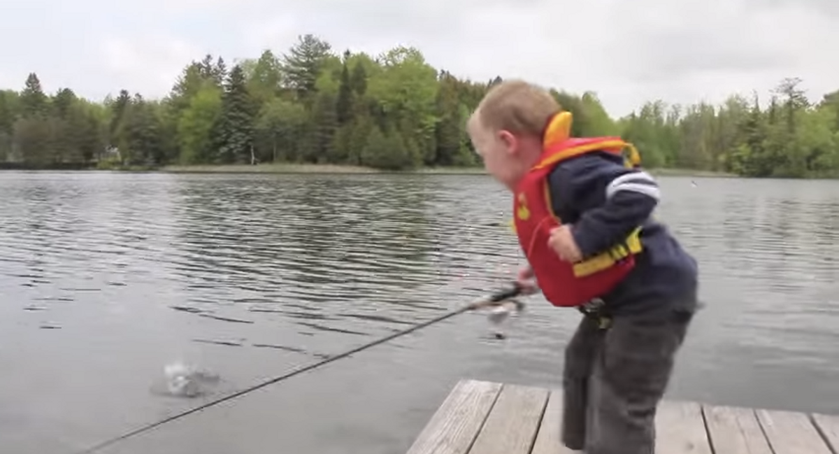 Boy Catches First Fish and His Reaction Is Priceless!