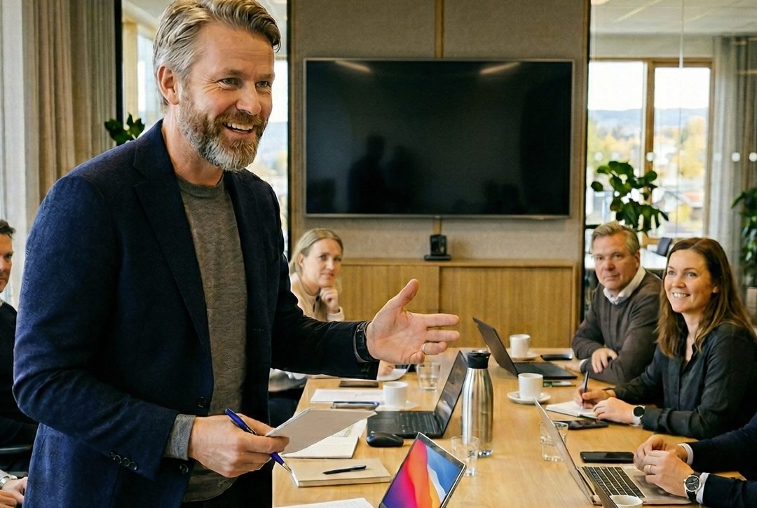 Juskonsulent leder et møte rundt et bord