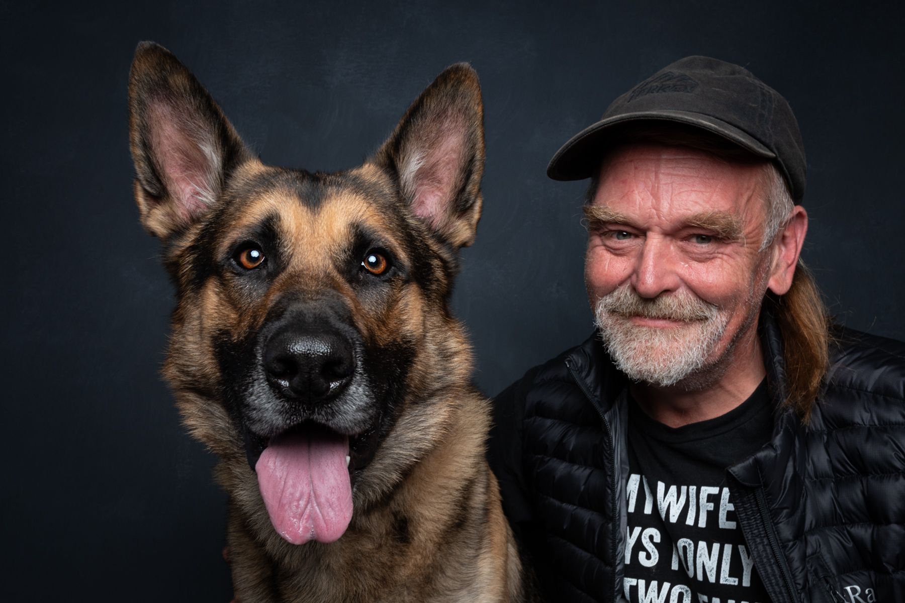 man with german shepherd