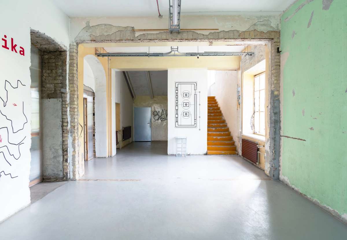 Geotraumatika exhibition hall at Atletika gallery with wall graphics