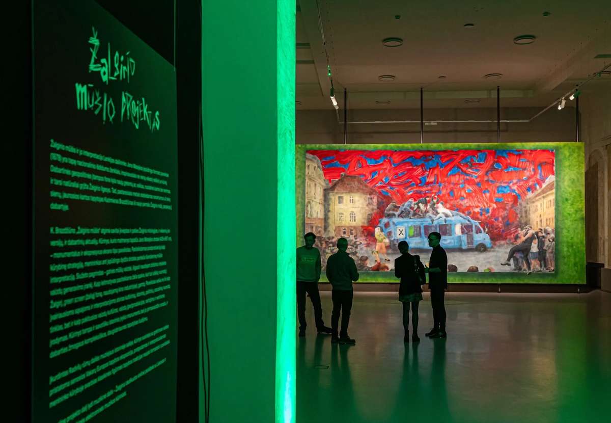 Žalgiris Battle Project exhibition room with green light and a large painting