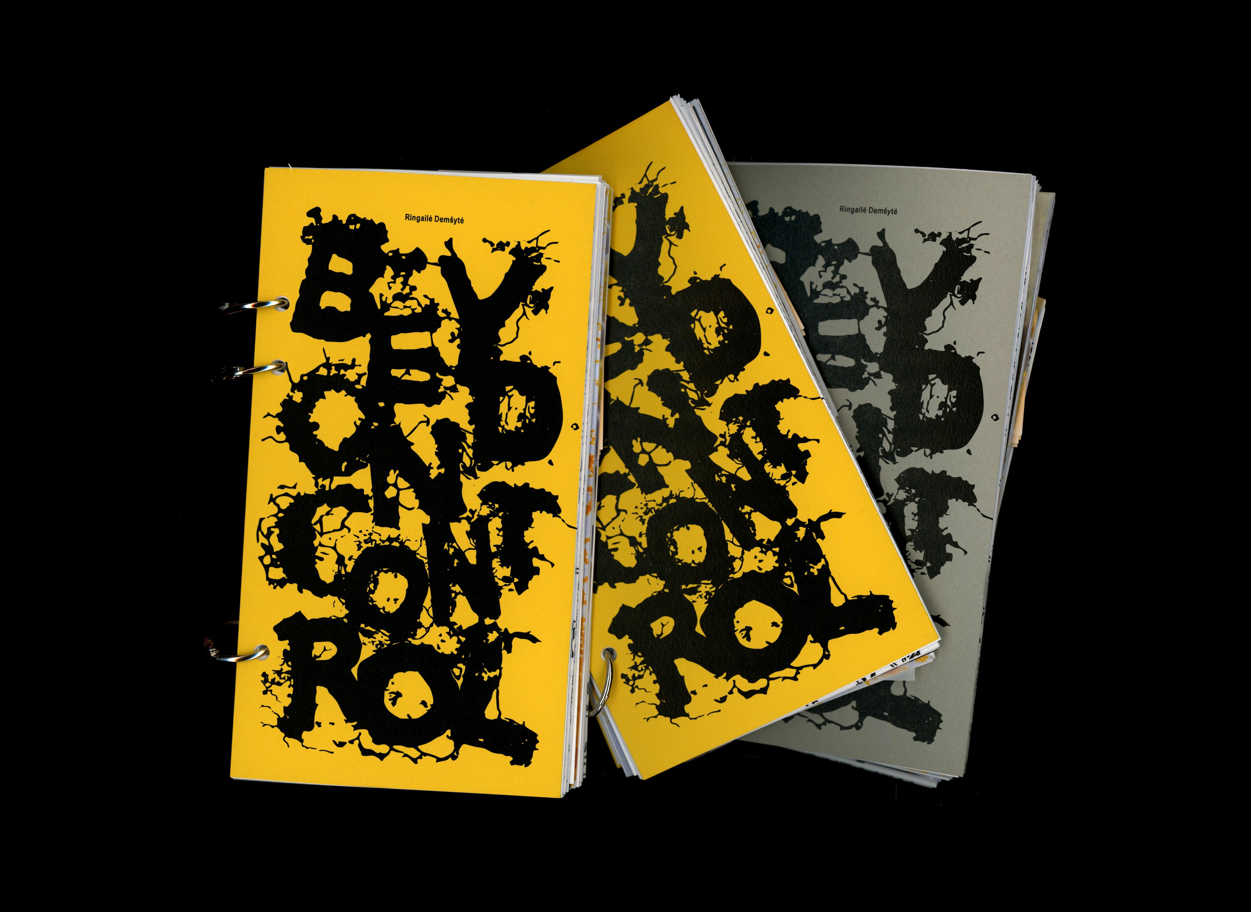 Three copies of the Beyond Control publication, their covers lettered in the slime mould typeface