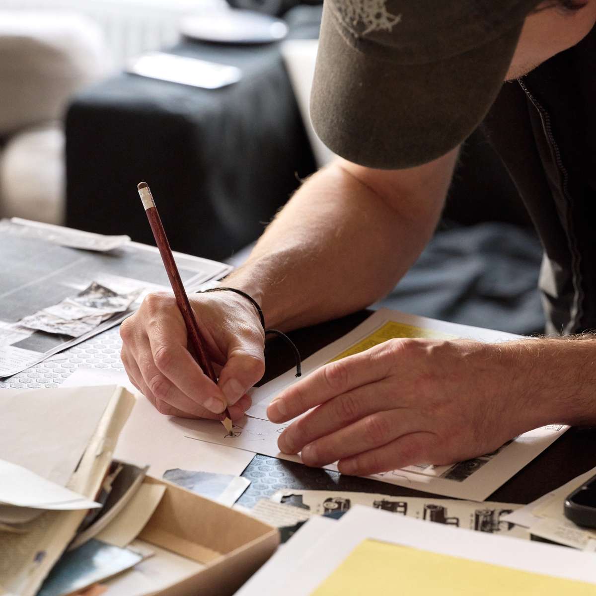 A participant drawing a zine spread by hand