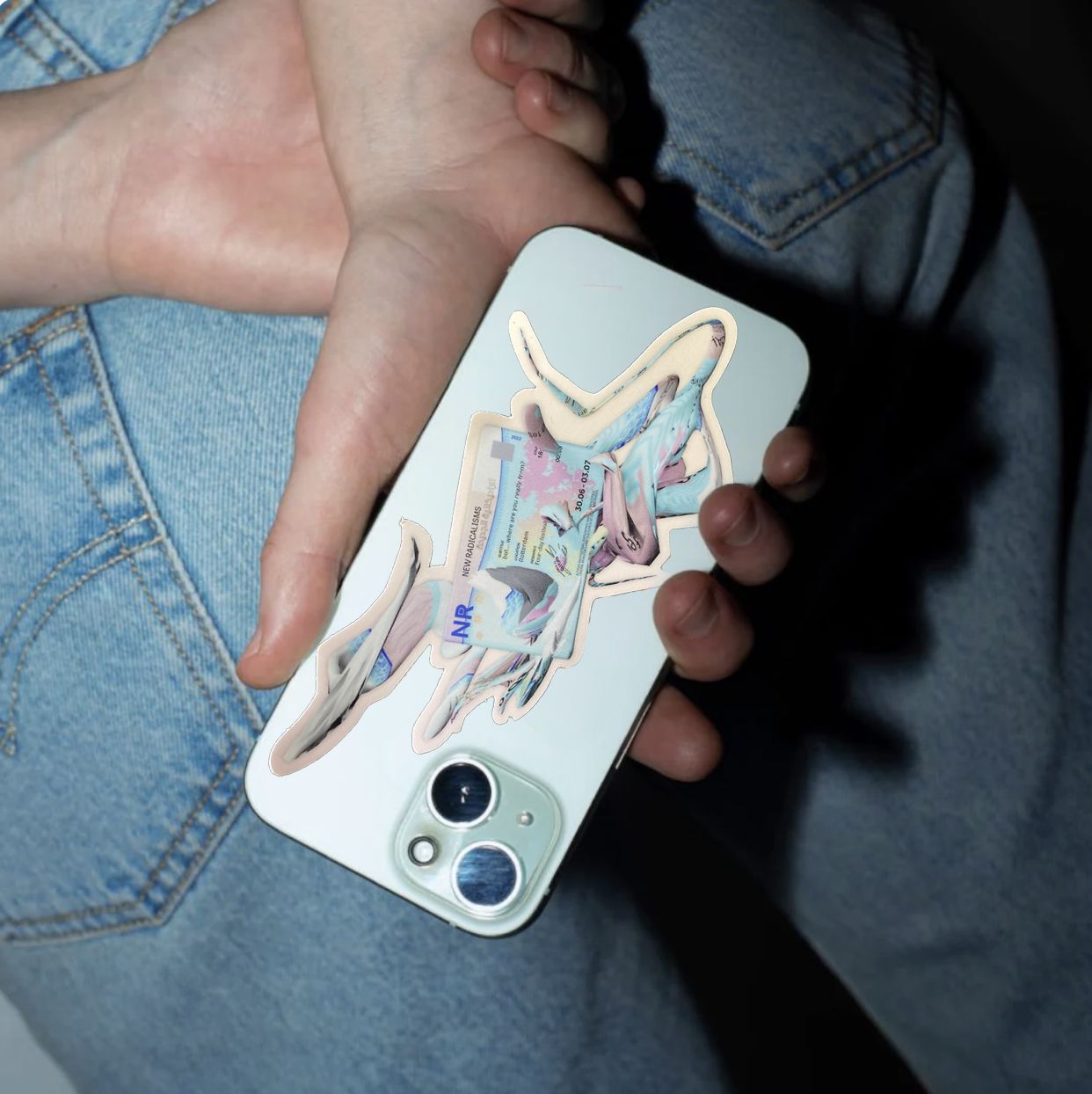 A hand holding a phone with a New Radicalisms phone case