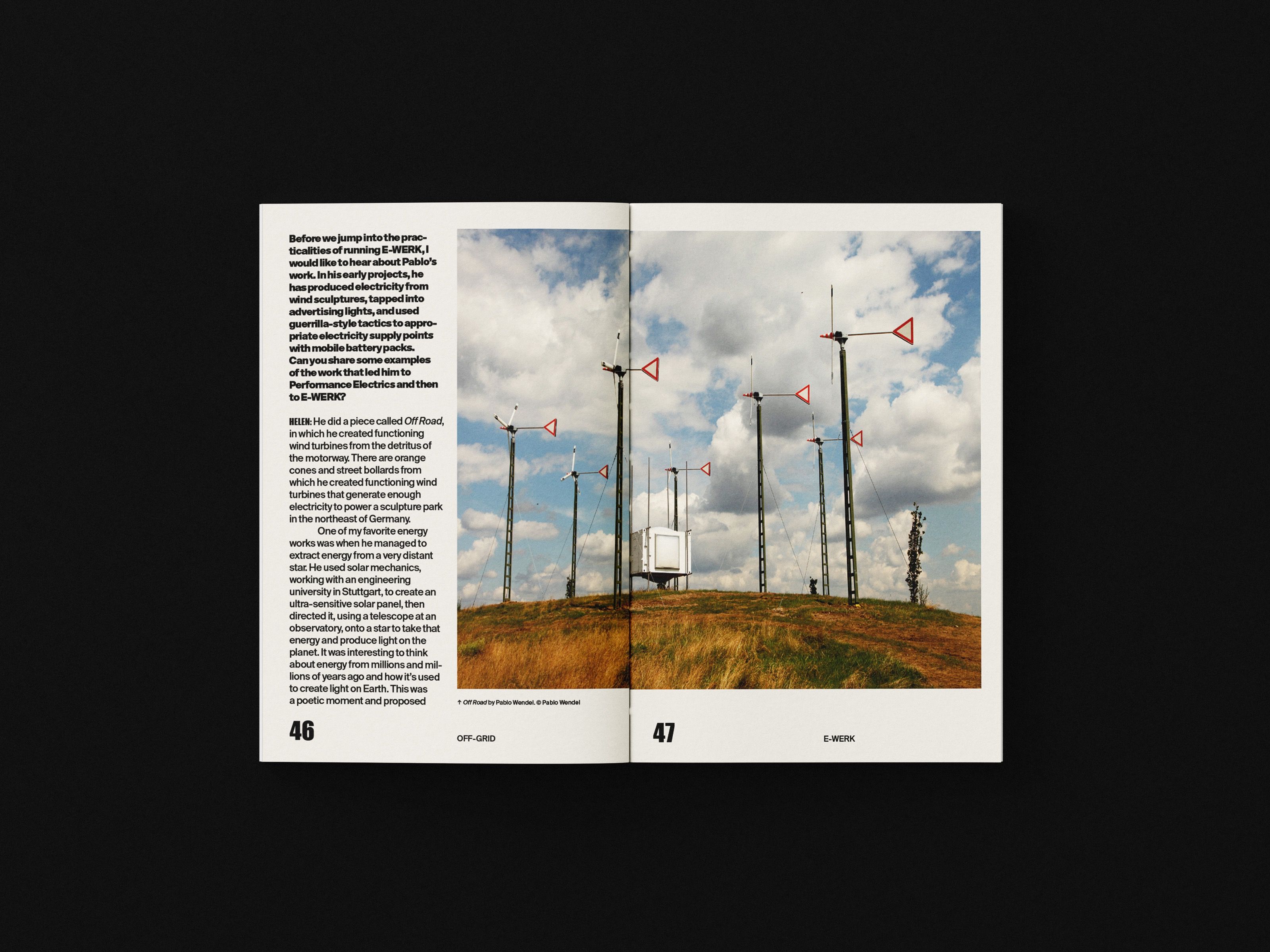 OFF-GRID book spread with a wind turbine landscape photo
