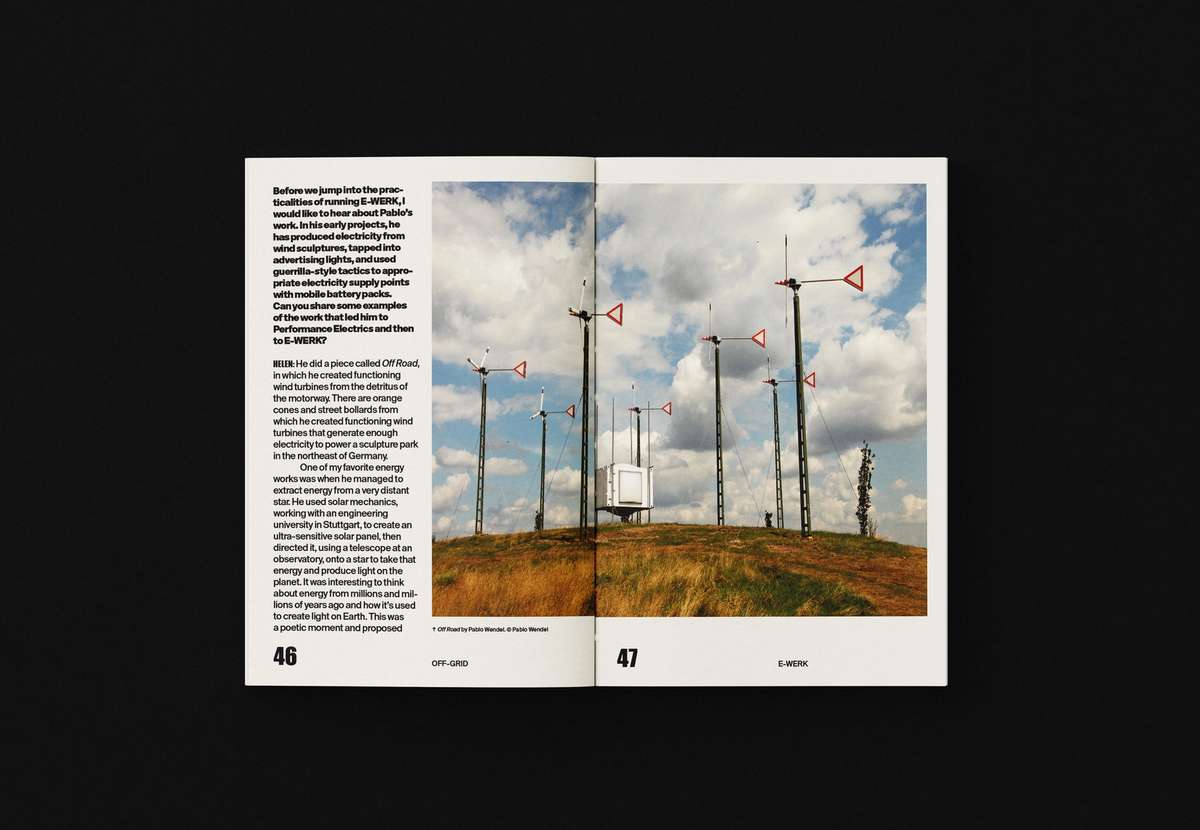 OFF-GRID book spread with a wind turbine landscape photo