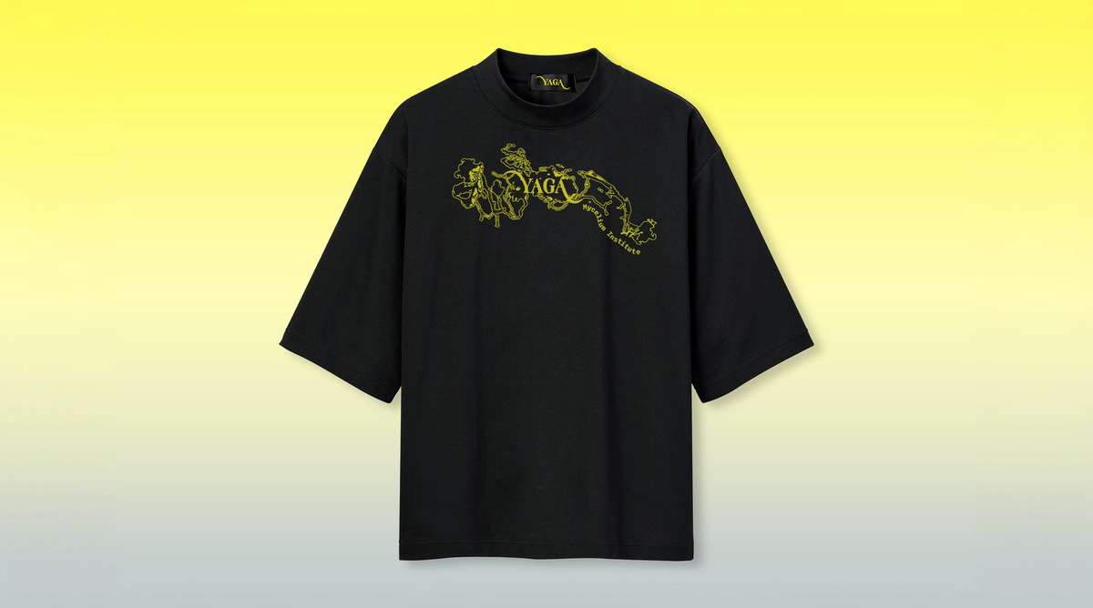 Black YAGA T-shirt with a yellow mycelium graphic on a yellow background