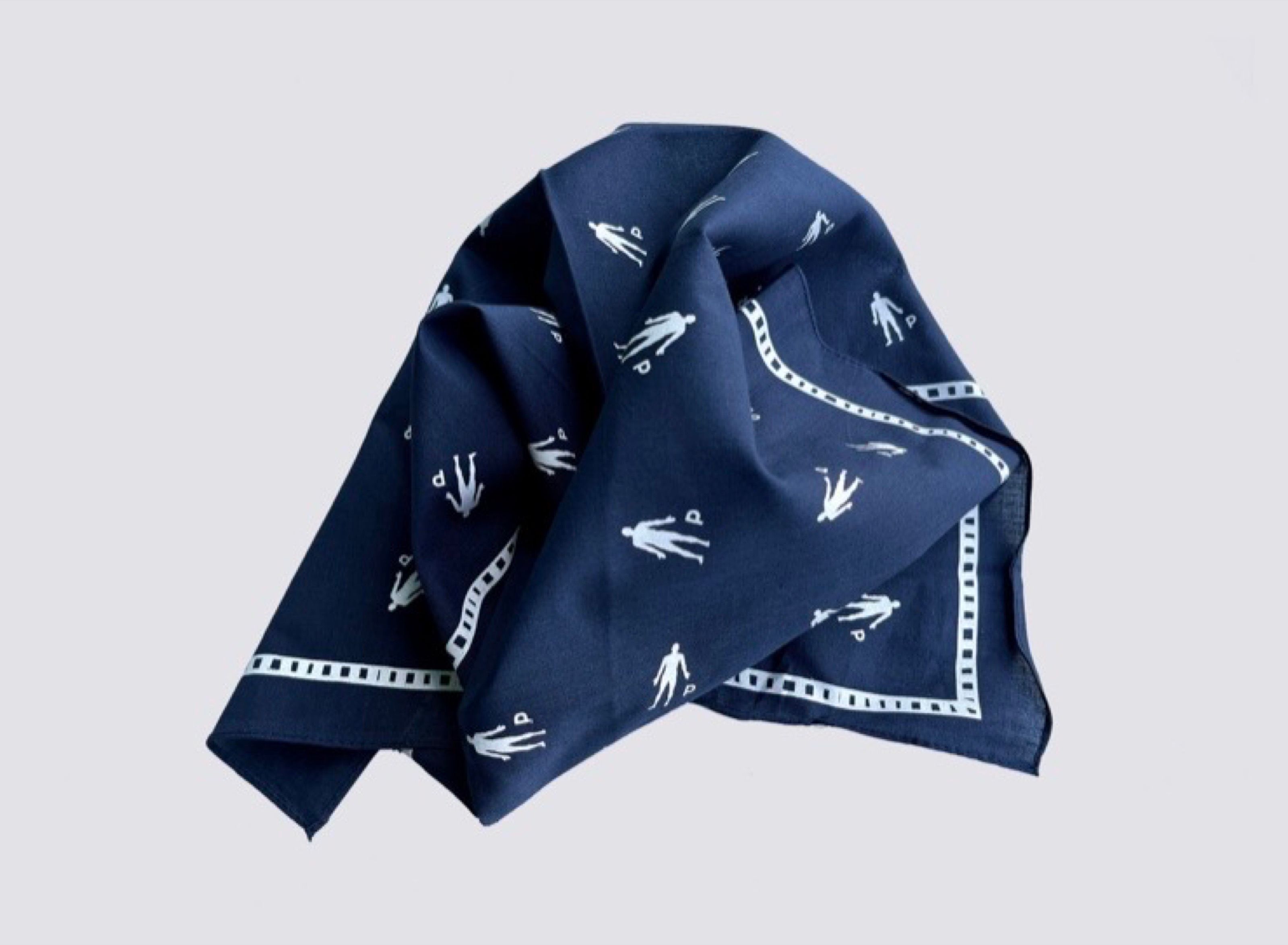 Navy bandana with a white figure pattern
