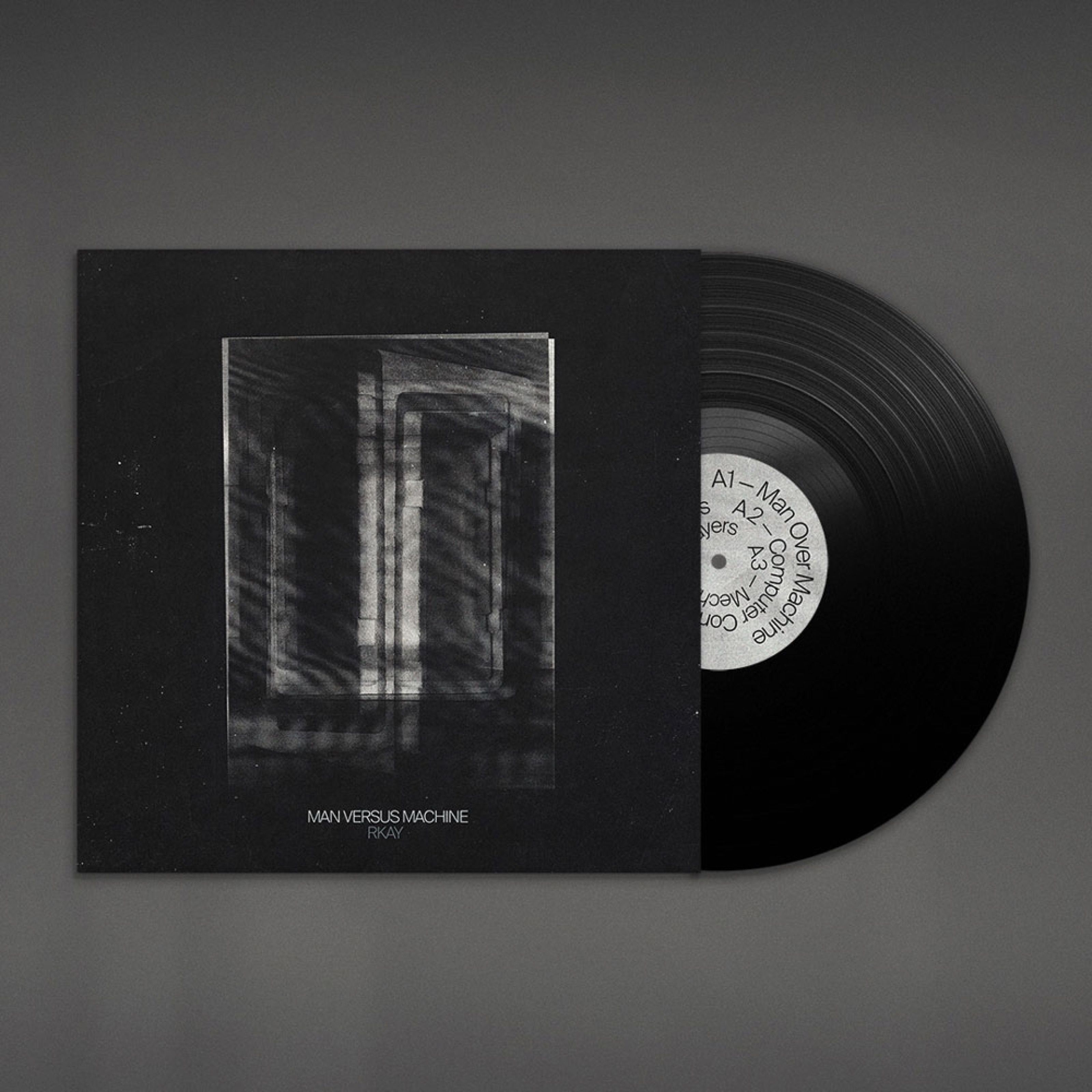 Man Versus Machine vinyl sleeve in black with a pale abstract image