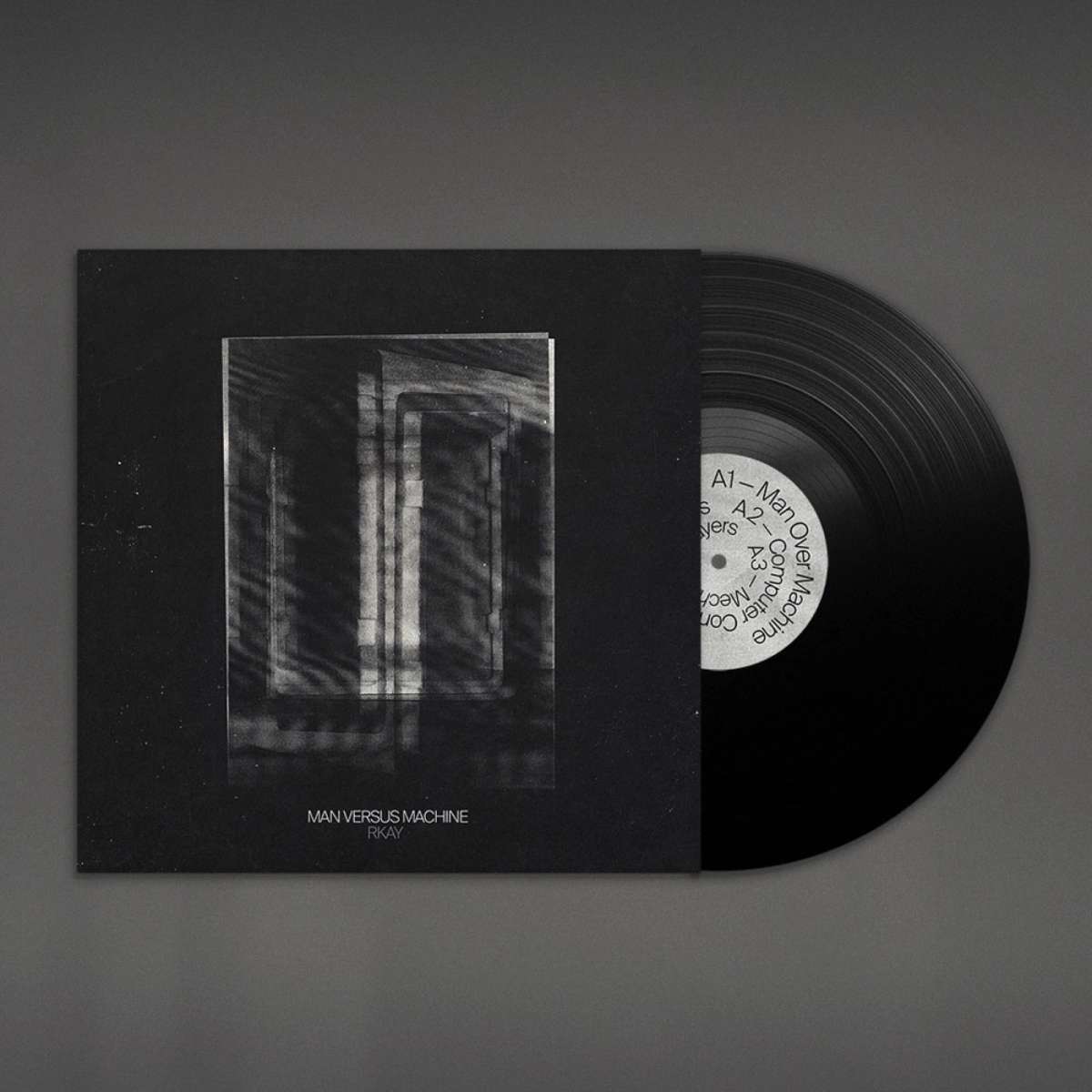 Man Versus Machine vinyl sleeve in black with a pale abstract image