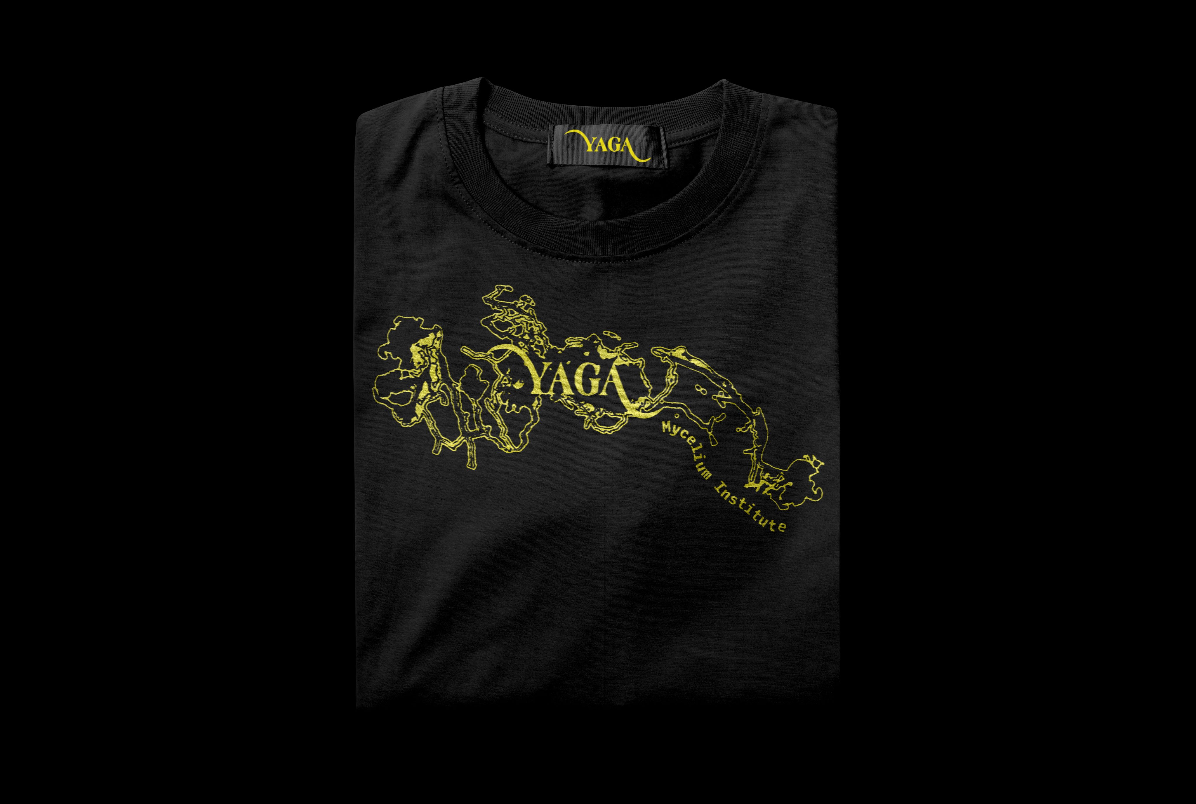 Folded black YAGA T-shirt with a yellow mycelium graphic
