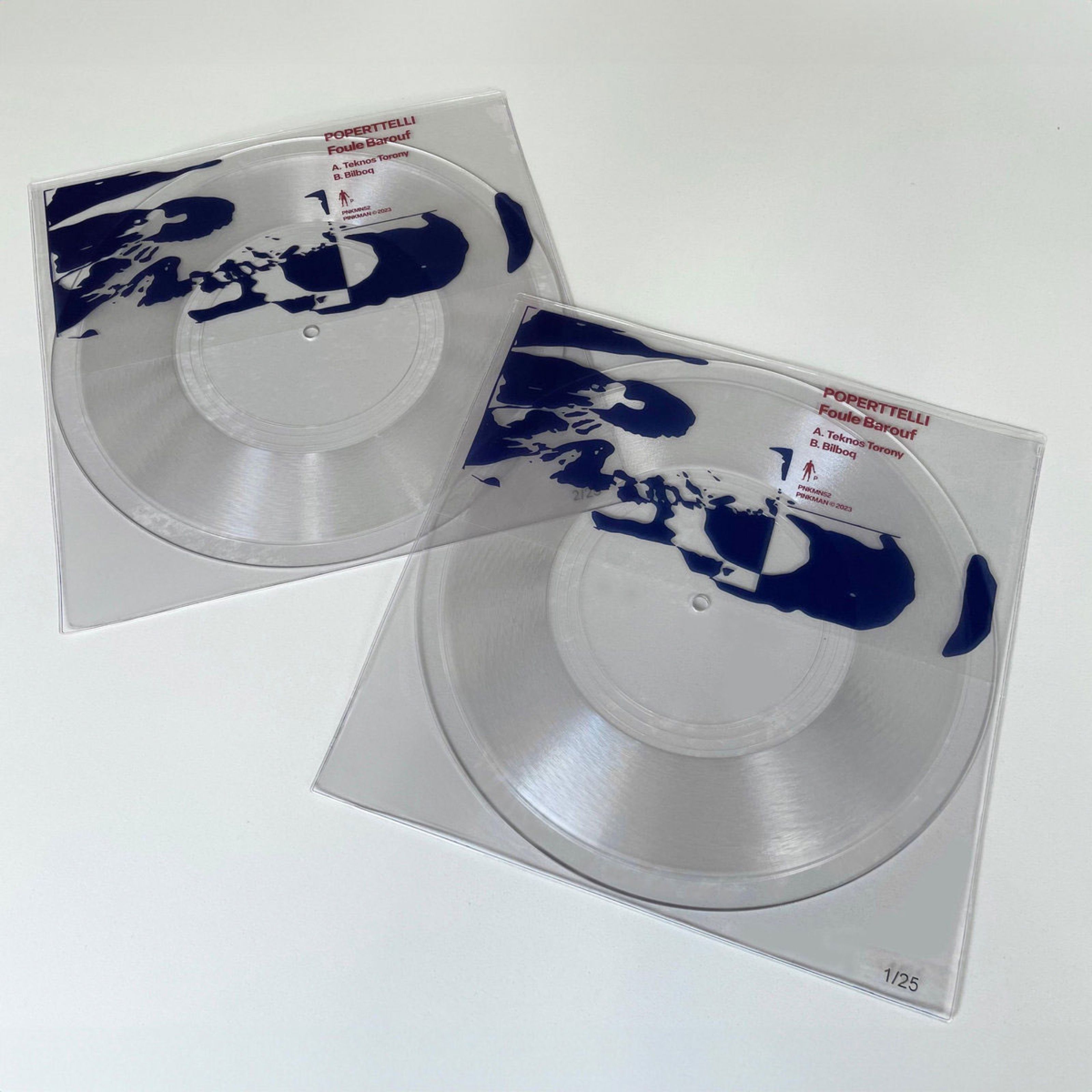 Two clear vinyl sleeves with a dark blue print