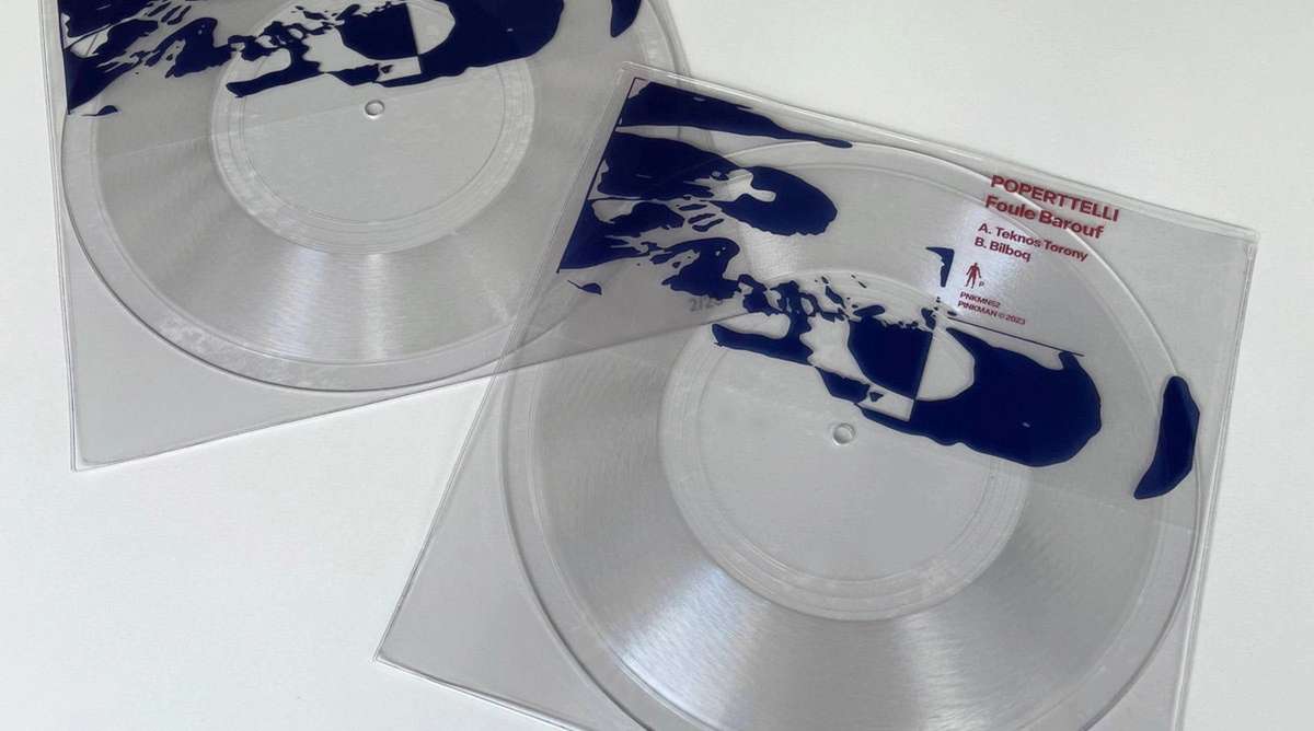 Two clear vinyl sleeves with a dark blue print