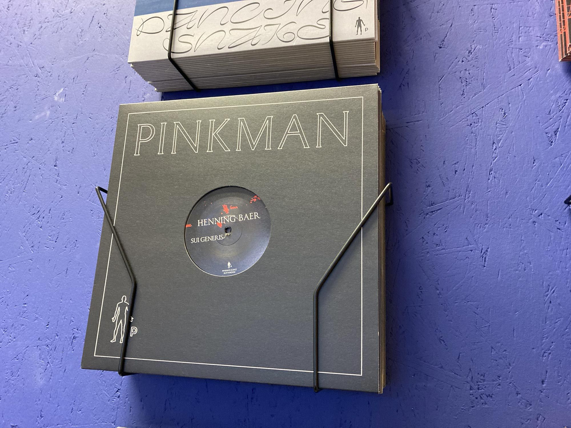 Pinkman Henning Baer record sleeve on a blue wall rack