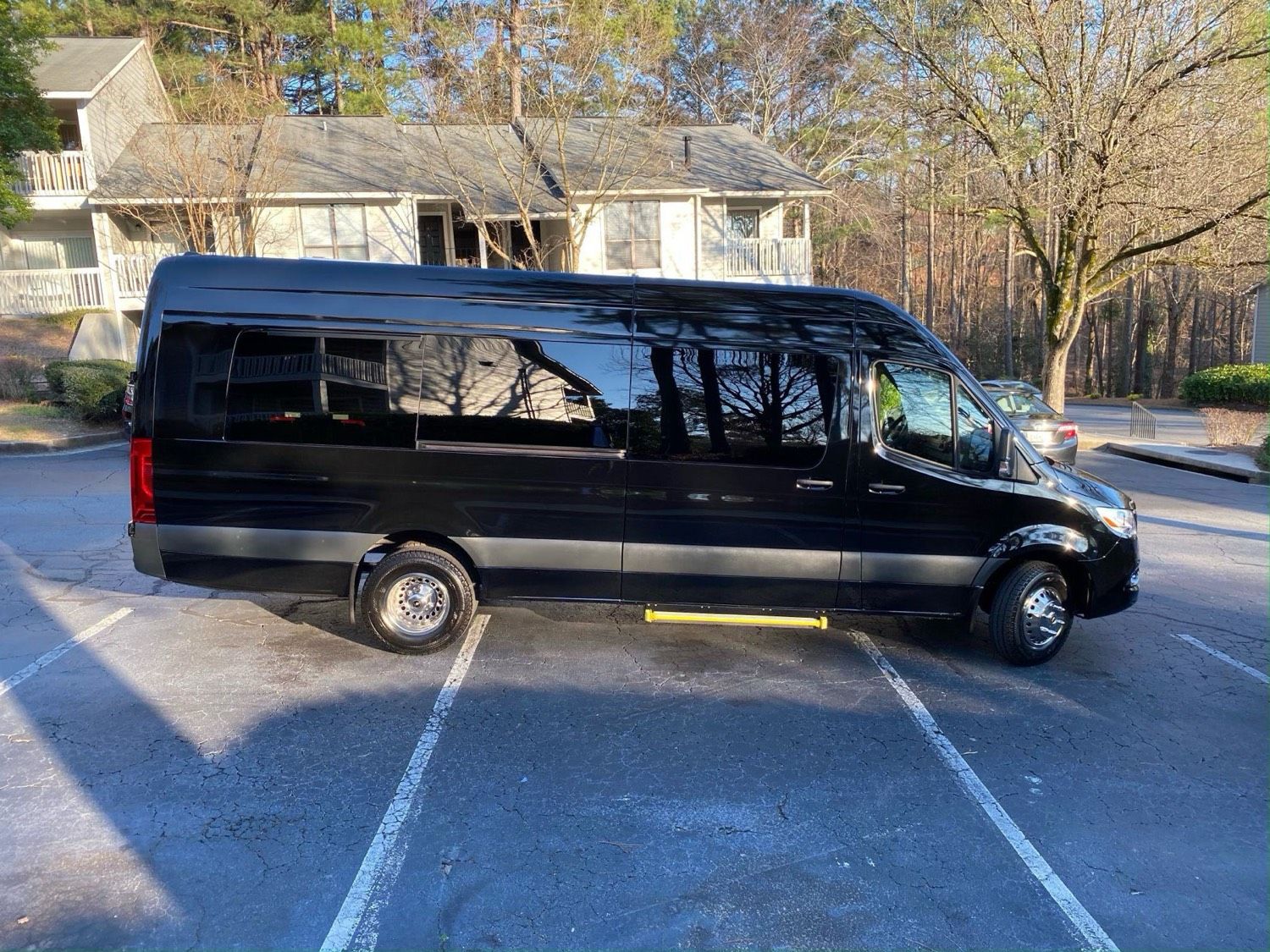 Mercedes Sprinter executive van with tan captain chairs