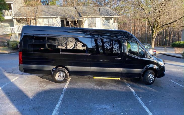 Mercedes Sprinter executive van with tan captain chairs
