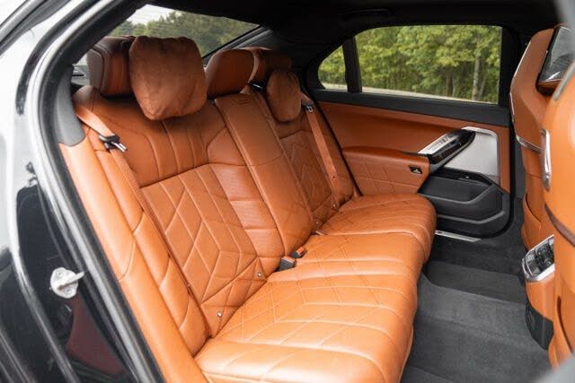 Rear cabin of the luxury sedan, quilted tan leather seats