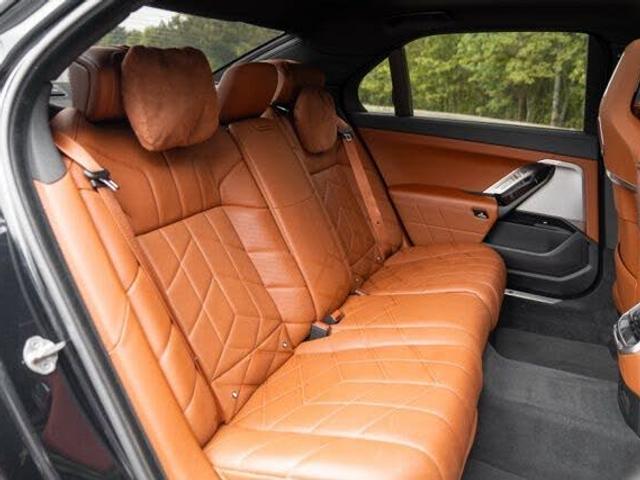 Rear cabin of the luxury sedan, quilted tan leather seats