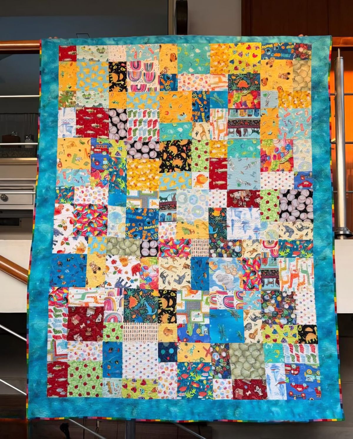 Child's I Spy quilt hung flat from another angle