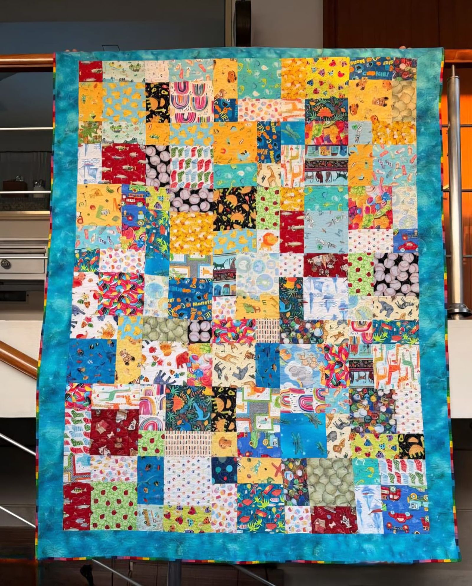 Child's I Spy quilt hung flat from another angle