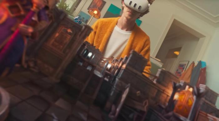 A person wearing a Meta Quest VR headset with a look of awe and excitement, their hands reaching out as if interacting with a virtual world. This image serves as one of the teaser marketing examples, showcasing the immersive experience of the product.