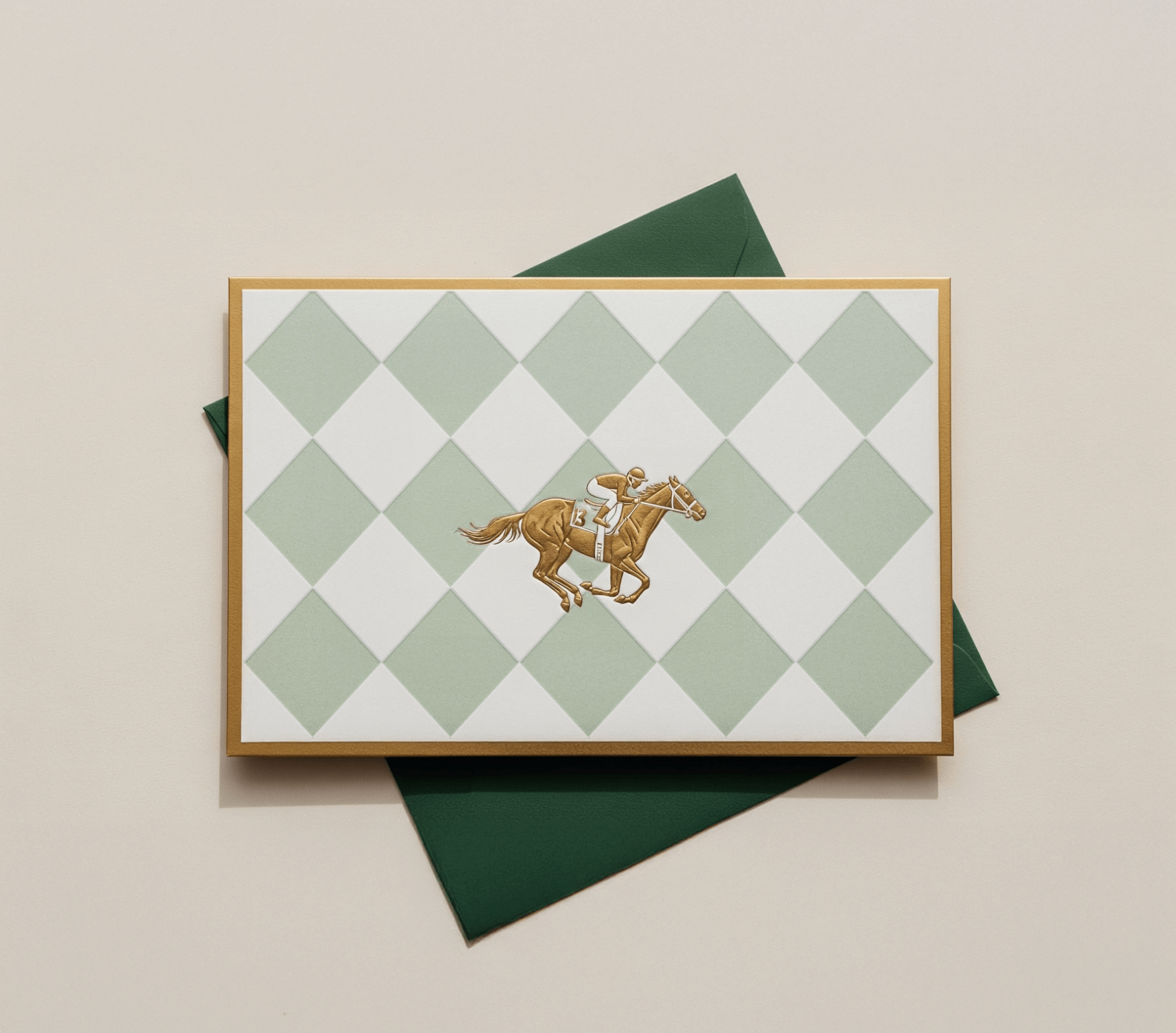 Custom Belmont Park invitation design featuring a horse racing motif and diamond pattern inspired by the historic New York racetrack. Love & War developed the brand vision, placemaking strategy and conceptual guest experience for the Belmont Park redevelopment, extending the destination identity across packaging, merchandise, signage, wayfinding and other branded touchpoints that connect Belmont Park’s horse racing heritage with its next generation of sports, retail and hospitality experiences.