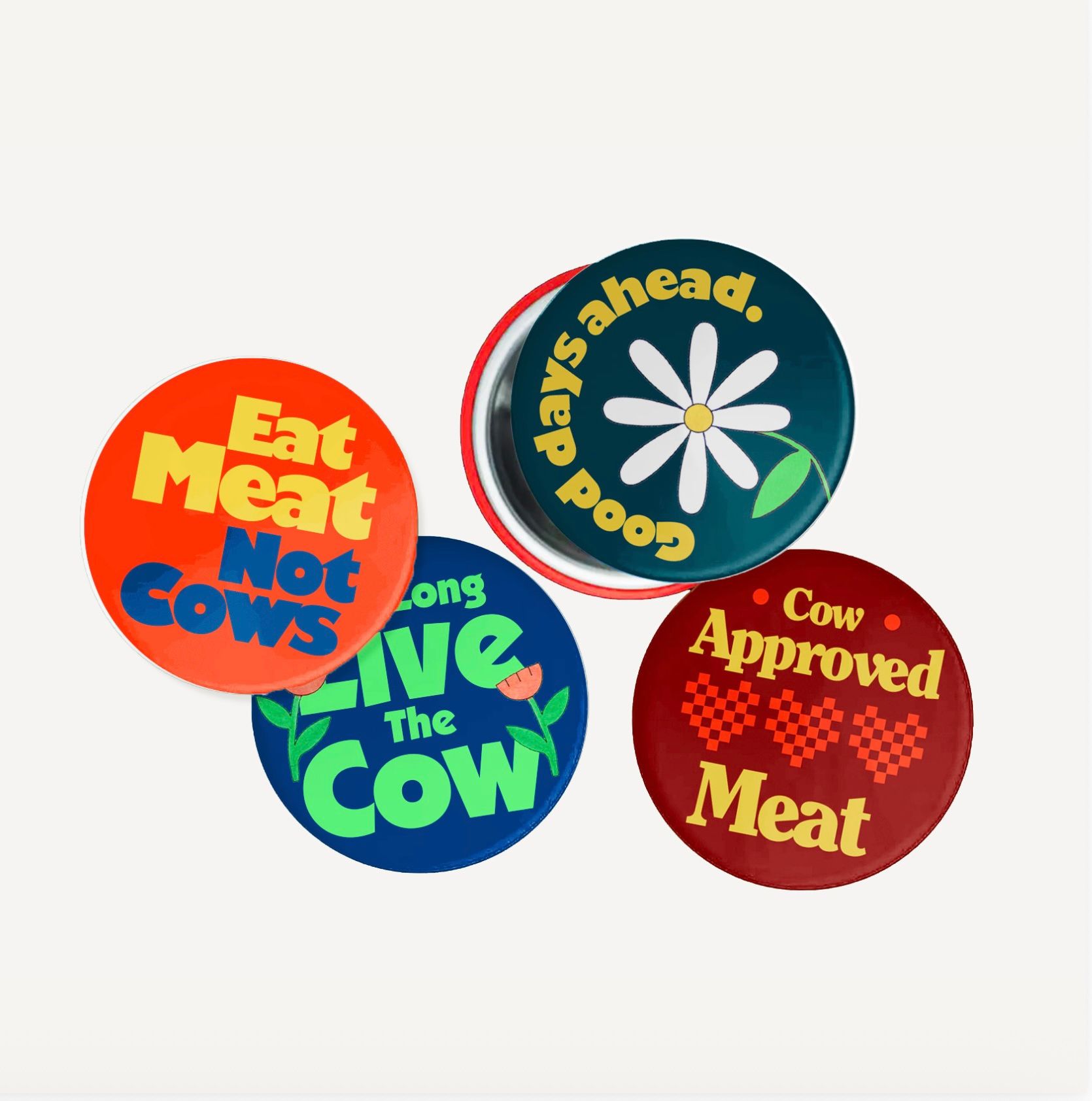 Custom Omeat campaign buttons designed by Love & War as part of the cultivated meat company’s visual identity and launch campaign. Bold typography, playful illustrations, and messaging including “Eat Meat Not Cows” and “Cow Approved Meat” express the brand’s optimistic approach to producing real meat without harming cows.
