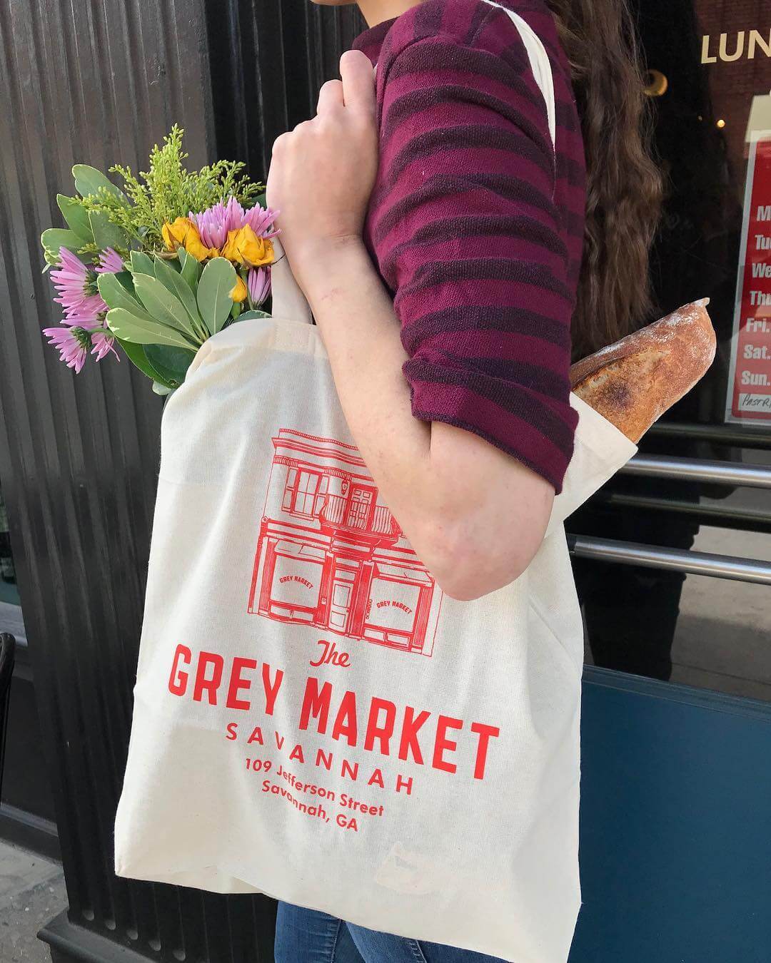 The Grey Market tote bag in Savannah, GA, featuring custom merchandise and brand identity by Love & War.