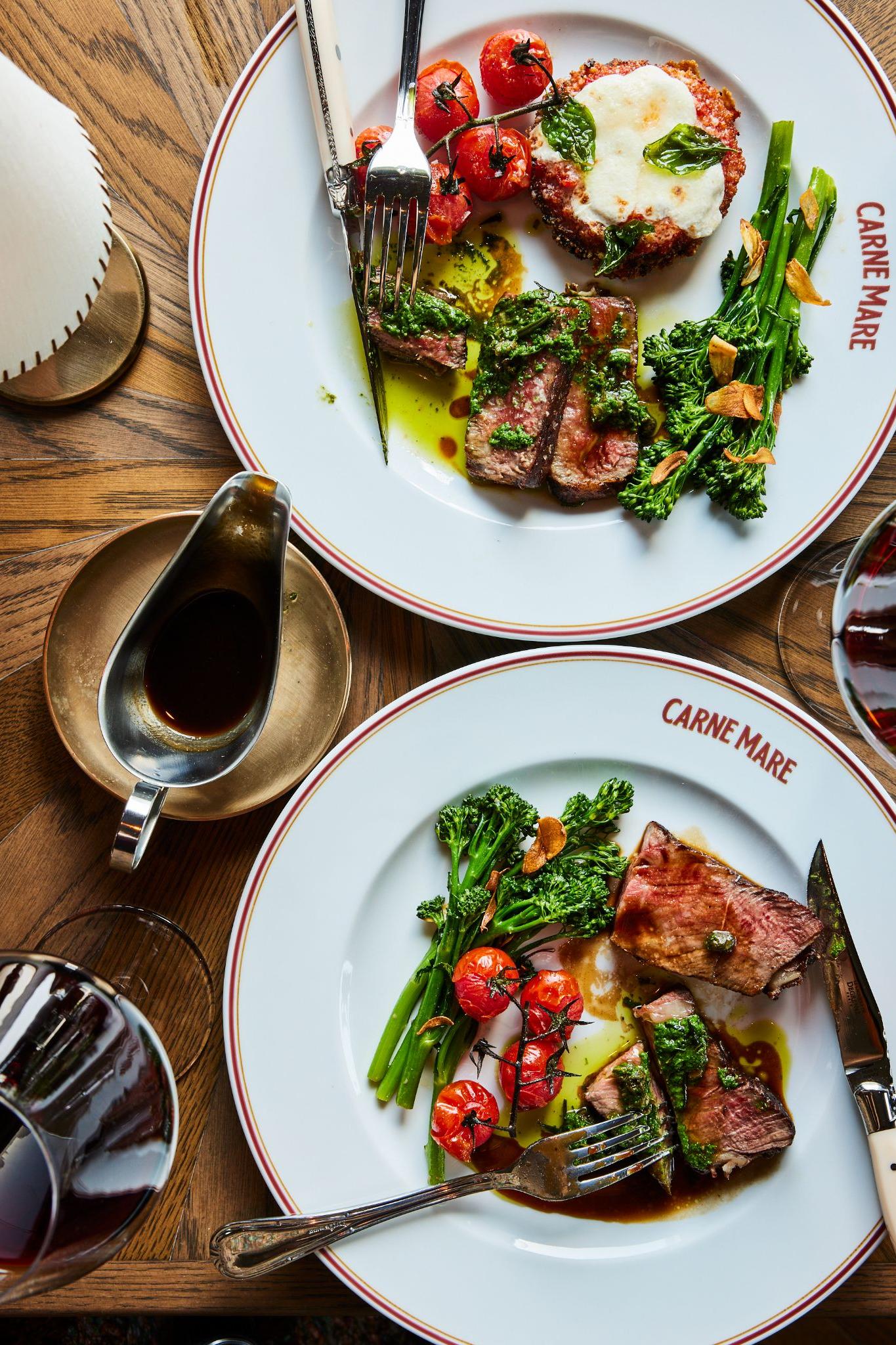 Steak and seasonal vegetables served on custom Carne Mare tableware at the Italian chophouse in New York City.