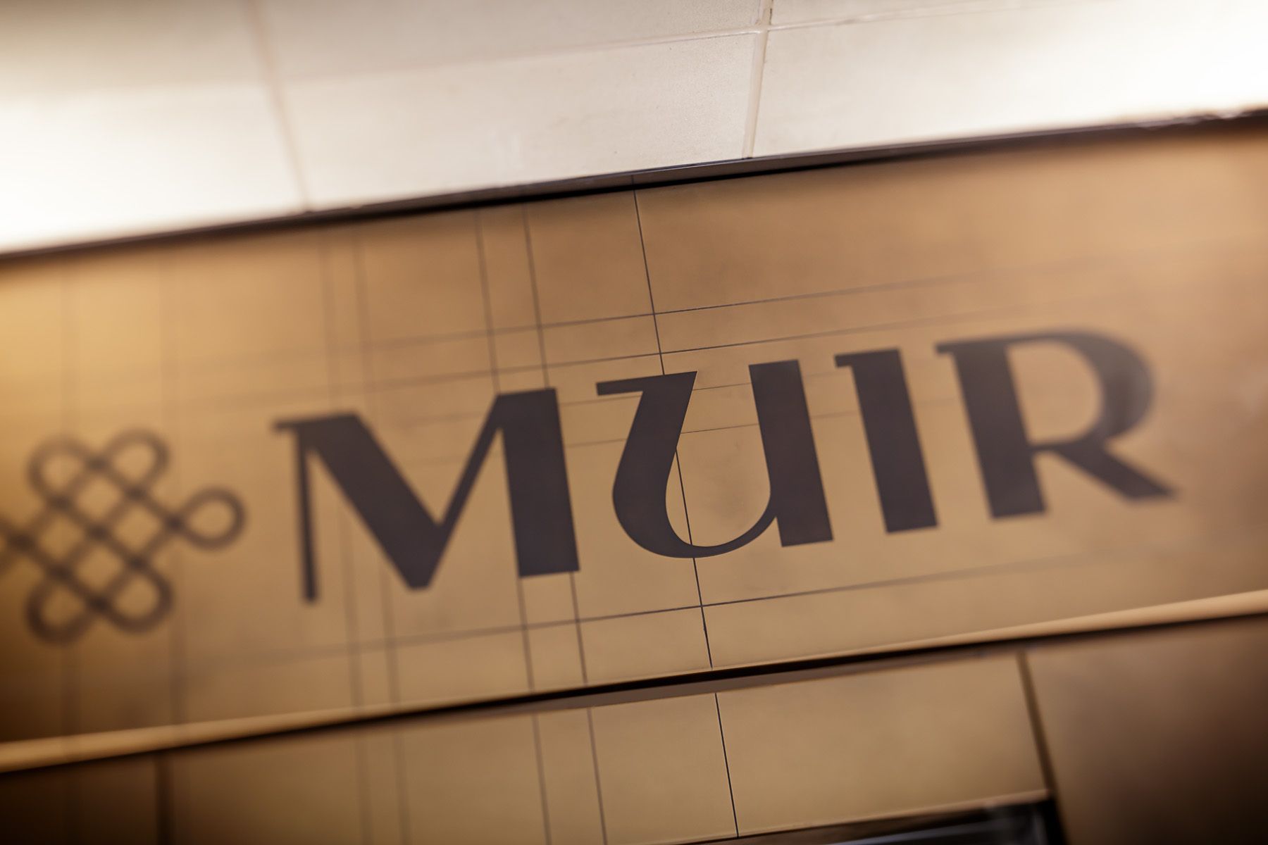 The Muir Halifax visual identity, developed by Love & War, draws inspiration from Nova Scotia's maritime heritage and enduring craftsmanship. The custom logotype and symbol balance contemporary elegance with a timeless sense of place, creating a distinctive luxury hospitality brand rooted in the region's culture and landscape.