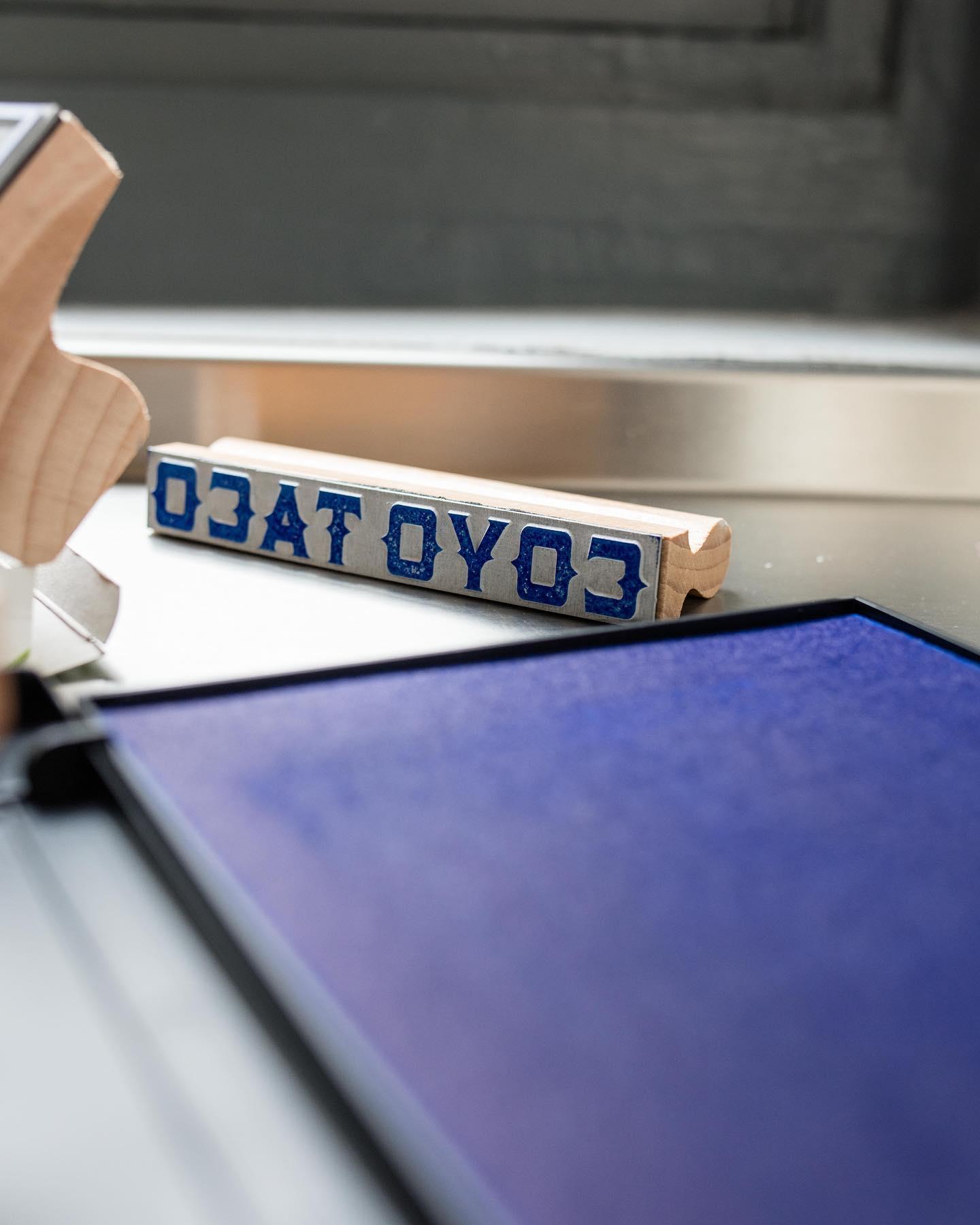 Coyo Taco branding stamp, part of the custom materials and visual identity developed by Love & War.
