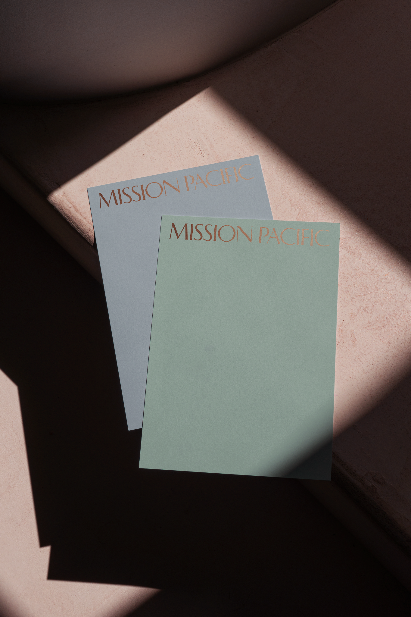 Mission Pacific branded stationery designed by Love & War as part of the Oceanside hotel’s visual identity and guest experience. The custom printed materials use a soft coastal color palette and refined typography inspired by the light, landscape, and relaxed character of Southern California.