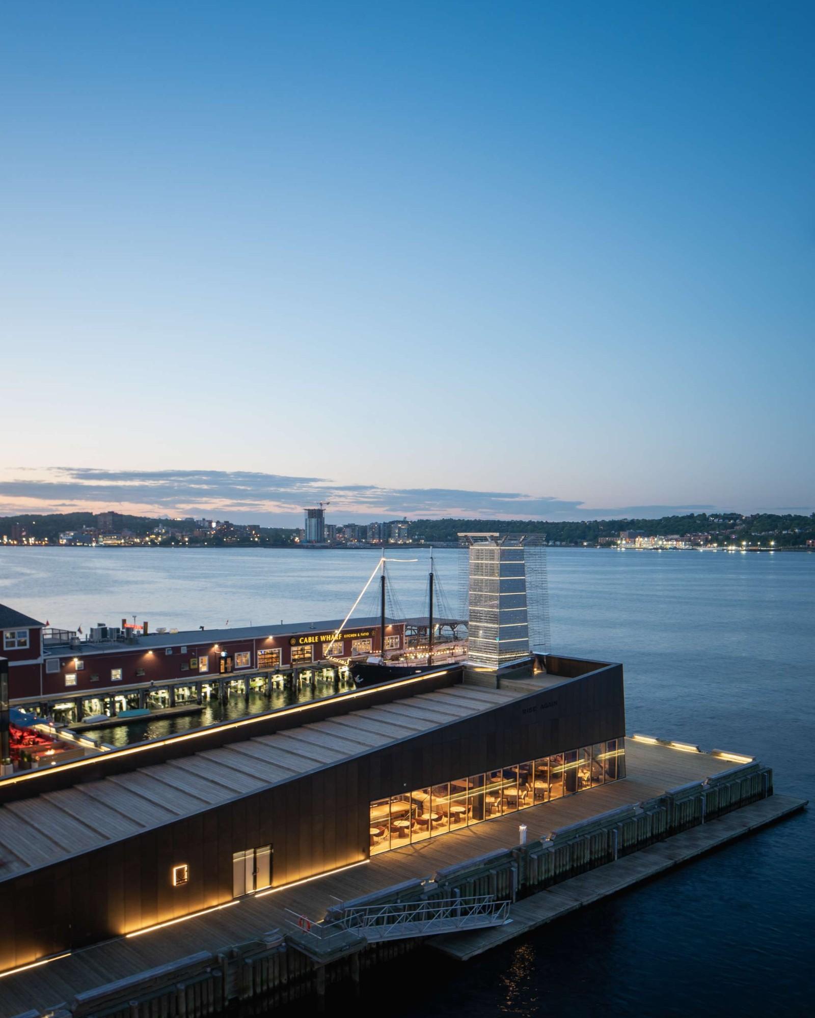 Muir Halifax extends onto Halifax Harbour as part of the Queen's Marque waterfront development, strengthening the hotel's connection to the water and the city. Love & War developed the hotel's brand strategy, naming, and visual identity to reflect Nova Scotia's maritime heritage and contemporary sense of place.