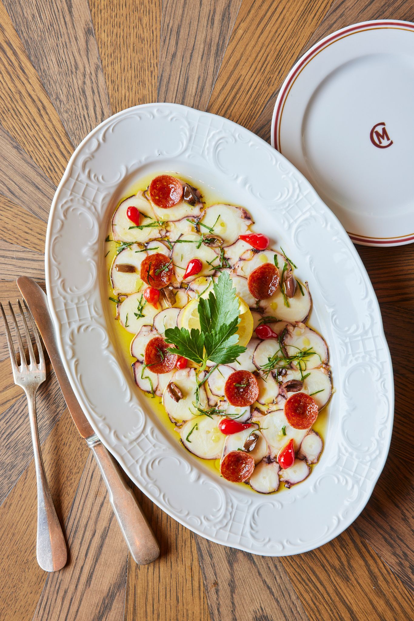 Italian seafood dish served on custom Carne Mare tableware at the Pier 17 restaurant in New York’s South Street Seaport.