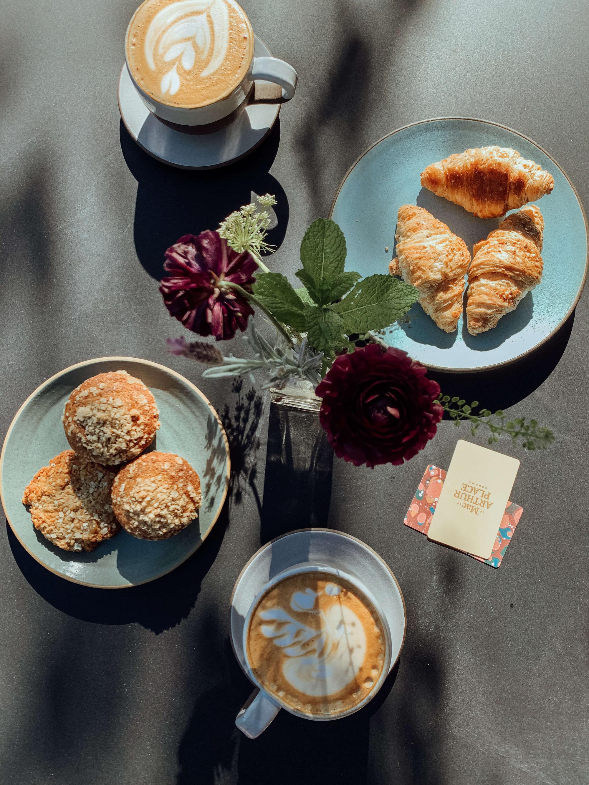 Breakfast and coffee at MacArthur Place Hotel & Spa, a luxury boutique hotel in Sonoma, California, featuring pastries, fresh flowers and branded guest details. Love & War developed the brand strategy, visual identity and guest experience for MacArthur Place, extending the Sonoma hotel brand across food and beverage, custom collateral, amenities and other hospitality touchpoints that express the property’s relaxed approach to natural luxury and Wine Country living.