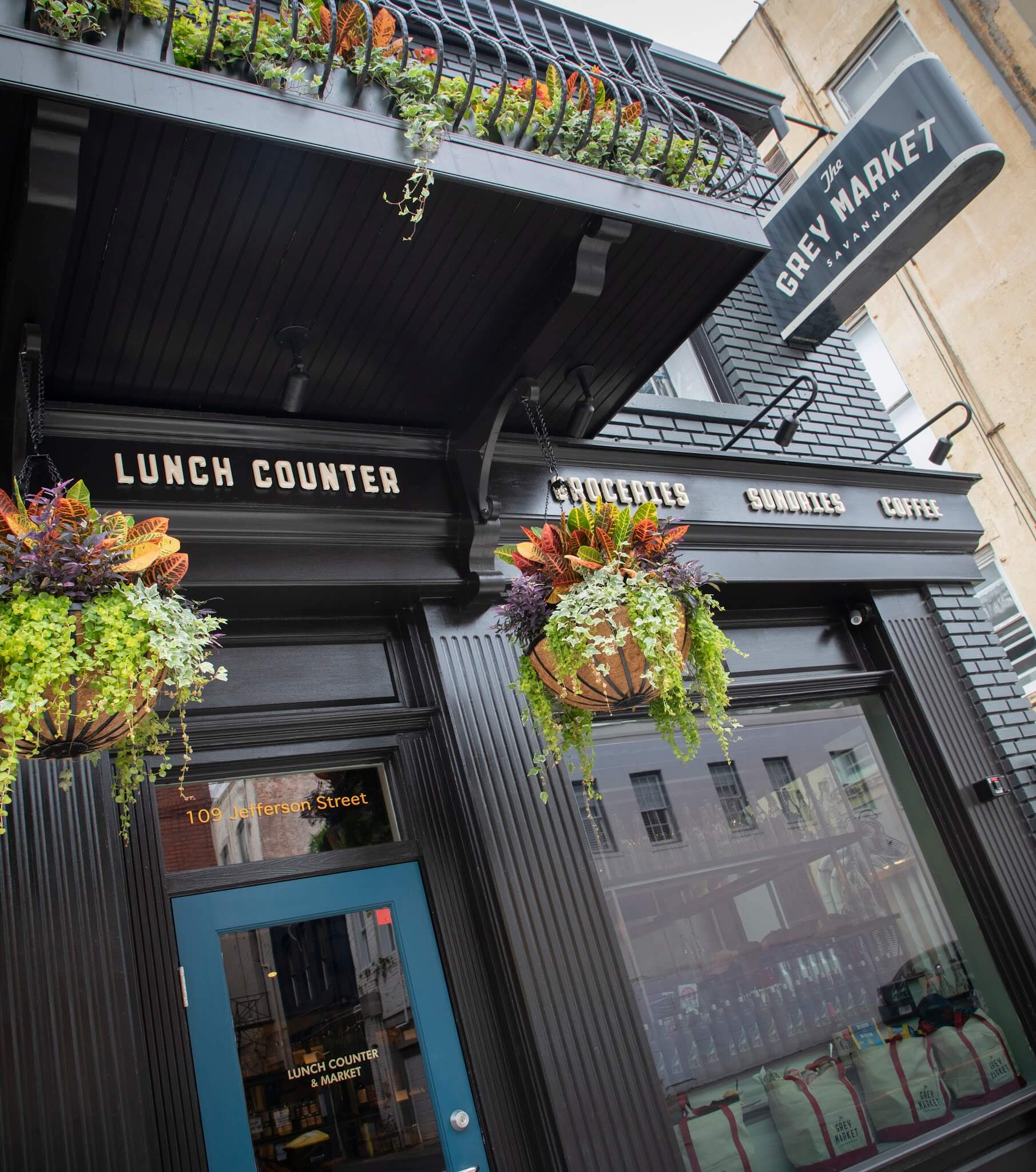 The Grey Market storefront in Savannah, GA, featuring signage and brand identity developed by Love & War.