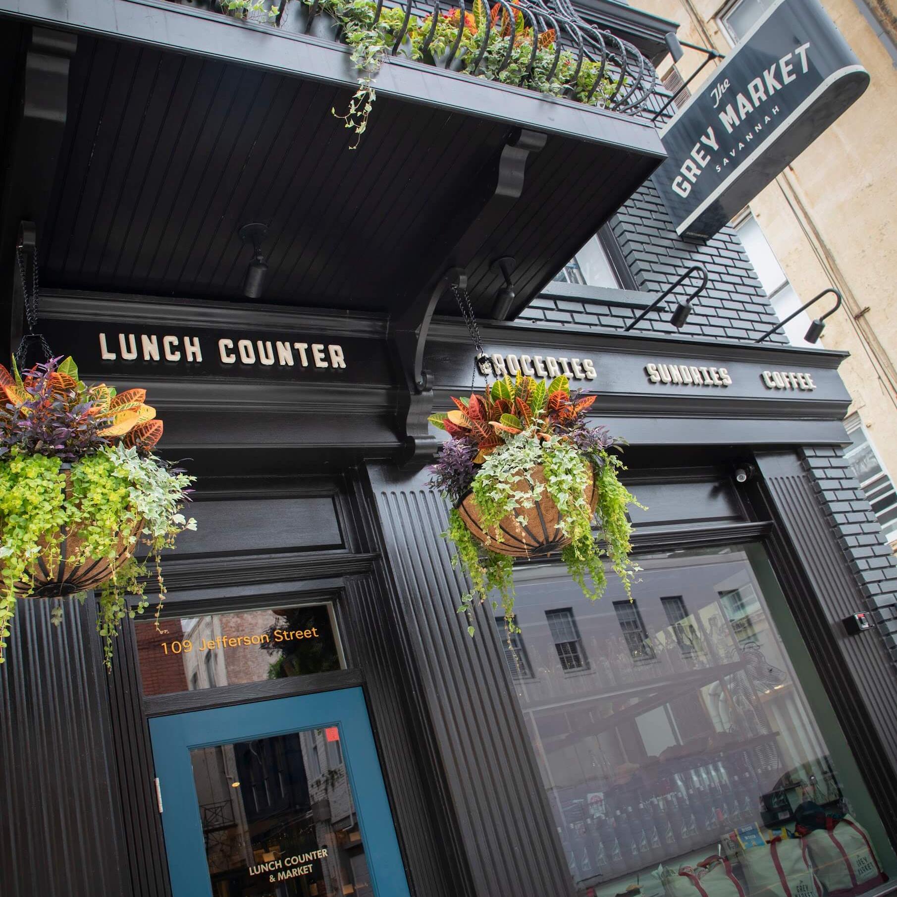 The Grey Market storefront in Savannah, GA, featuring signage and brand identity developed by Love & War.