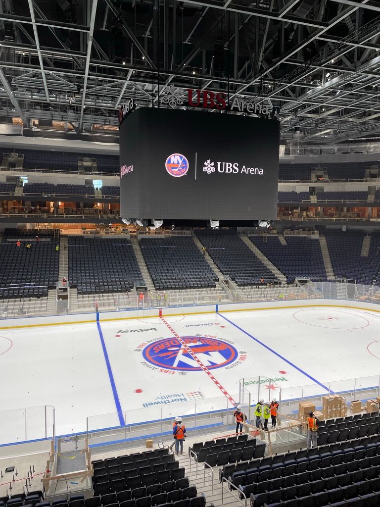 Center ice at UBS Arena, home of the New York Islanders, with venue experience by Love & War.