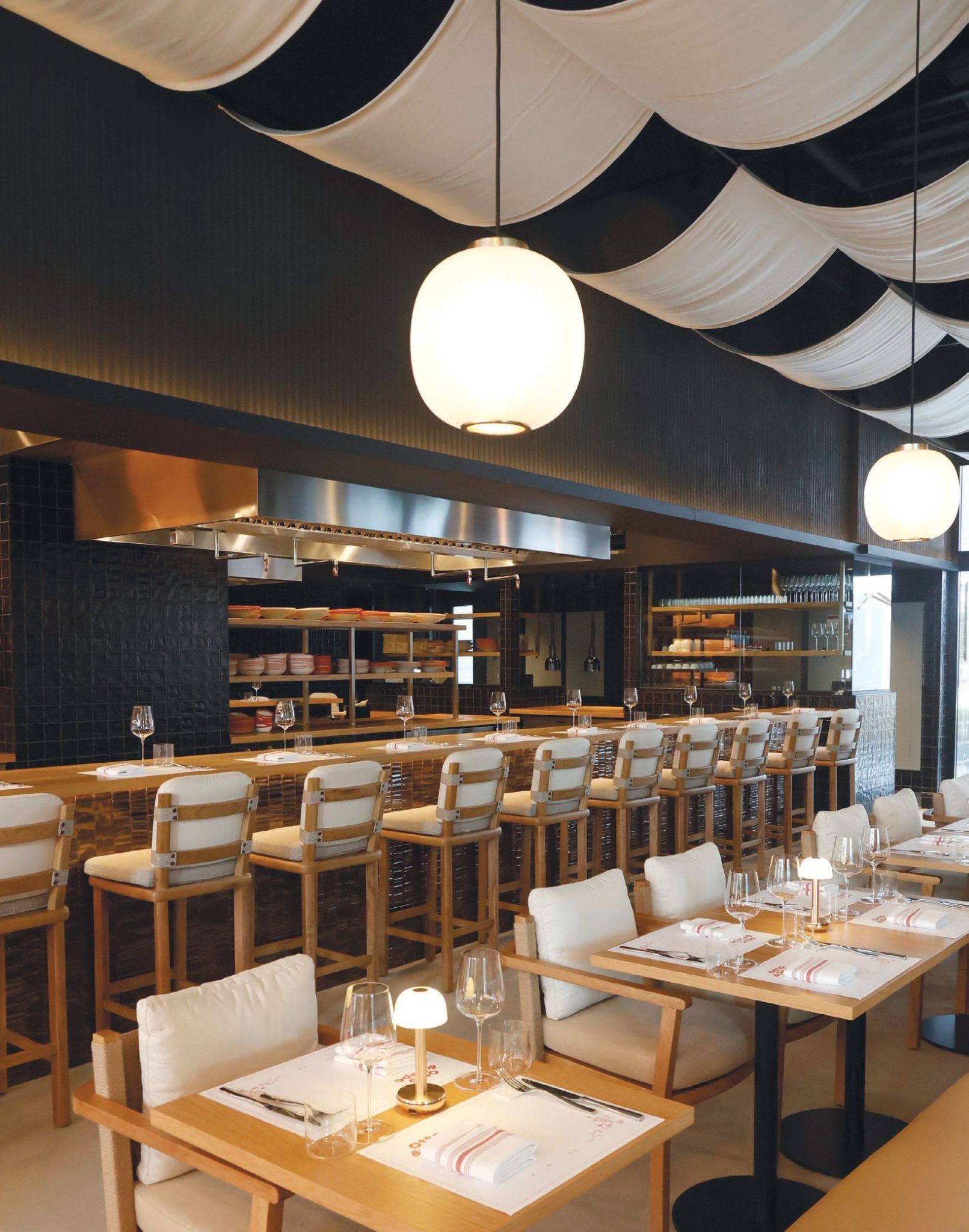 Inside Otto & Pepe in Wynwood, Miami, the intimate dining room centers around an open kitchen and omakase-style pasta bar, creating a direct connection between guests and chefs. Love & War developed the restaurant’s brand identity and visual language to complement the warm, understated interior and its distinctive combination of handmade pasta, natural wine, and relaxed Miami hospitality.