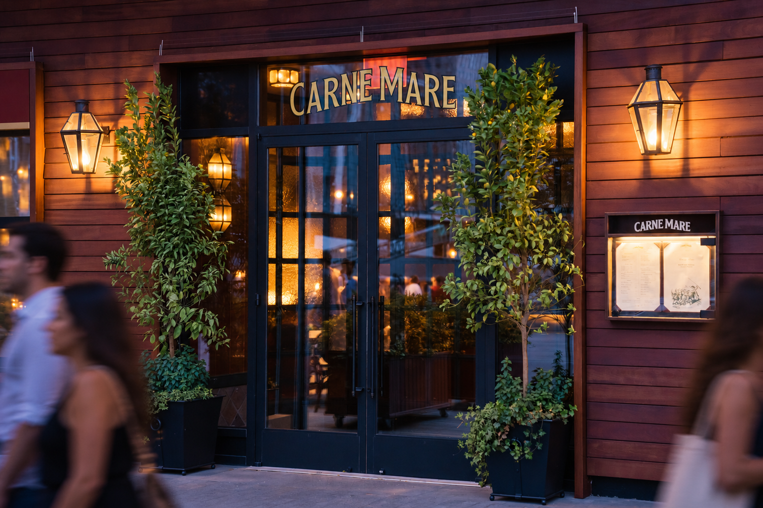 Carne Mare restaurant entrance at Pier 17 in New York’s South Street Seaport, featuring custom signage and identity by Love & War