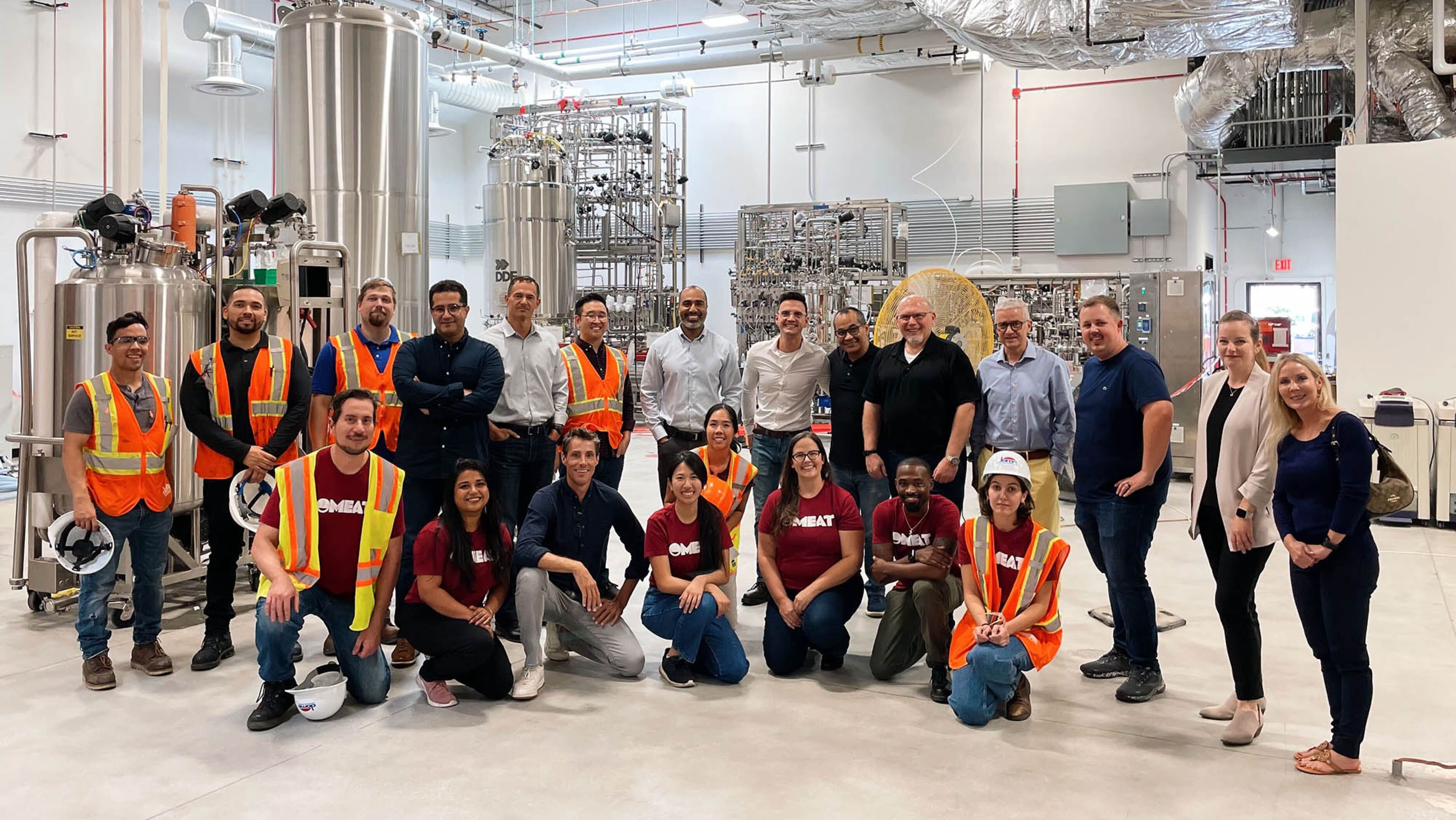 Omeat team at the company’s cultivated meat production facility, surrounded by the technology used to produce real meat without harming cows. Love & War developed Omeat’s brand strategy and visual identity, helping translate a complex food technology innovation into a clear, approachable consumer brand.