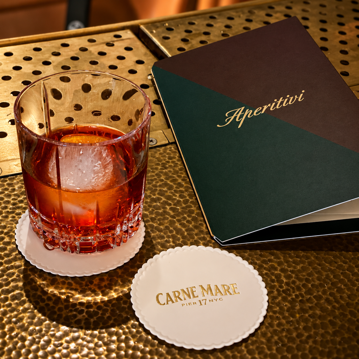 Carne Mare cocktail, branded coaster and Aperitivo menu showcasing the restaurant identity and materials designed by Love & War.