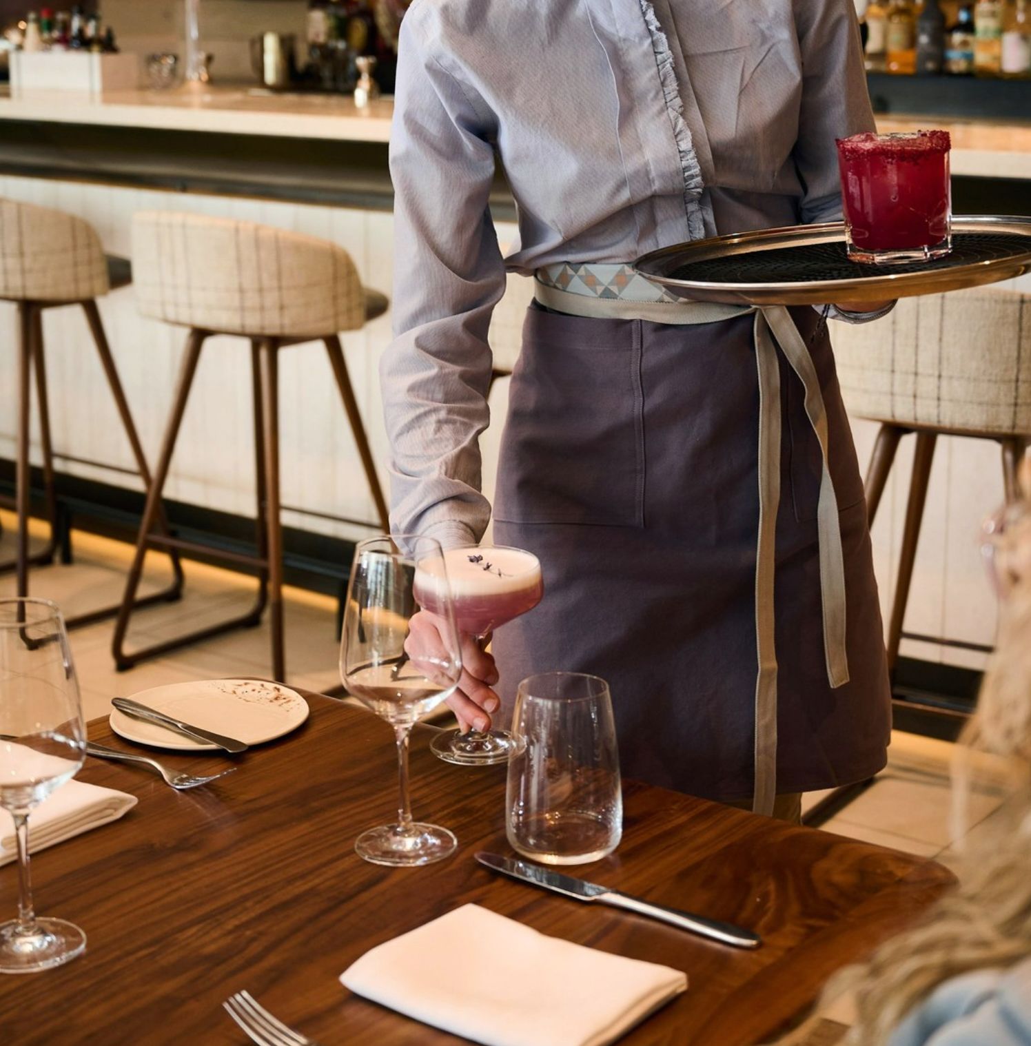 Custom hospitality uniforms created by Love & War for Drift, the signature restaurant at Muir Halifax. Designed as part of the restaurant's visual identity, the uniforms reinforce the luxury dining experience through bespoke apparel inspired by Nova Scotia's natural landscape and understated elegance.
